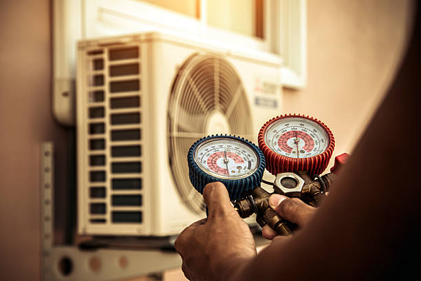Professional Hvac technician working in Calverton, MD